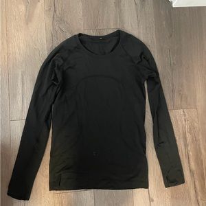 Lululemon black long sleeve swiftly, barely worn size 8
